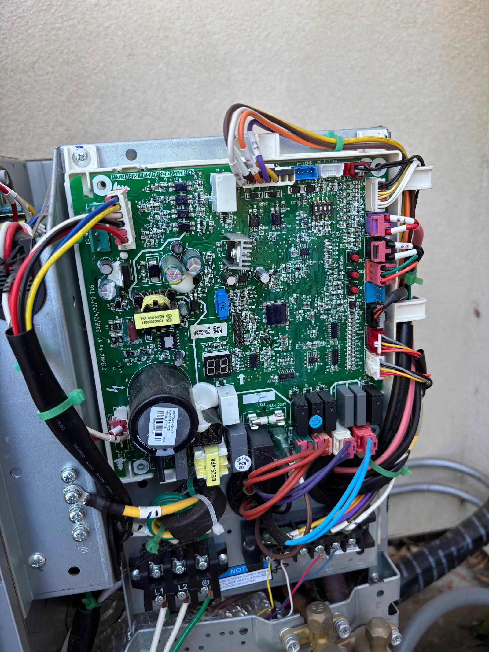 An HVAC control board opened up for diagnosis