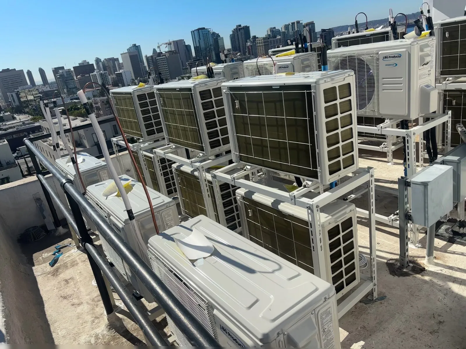 A bank of rooftop condensing units on a commercial building